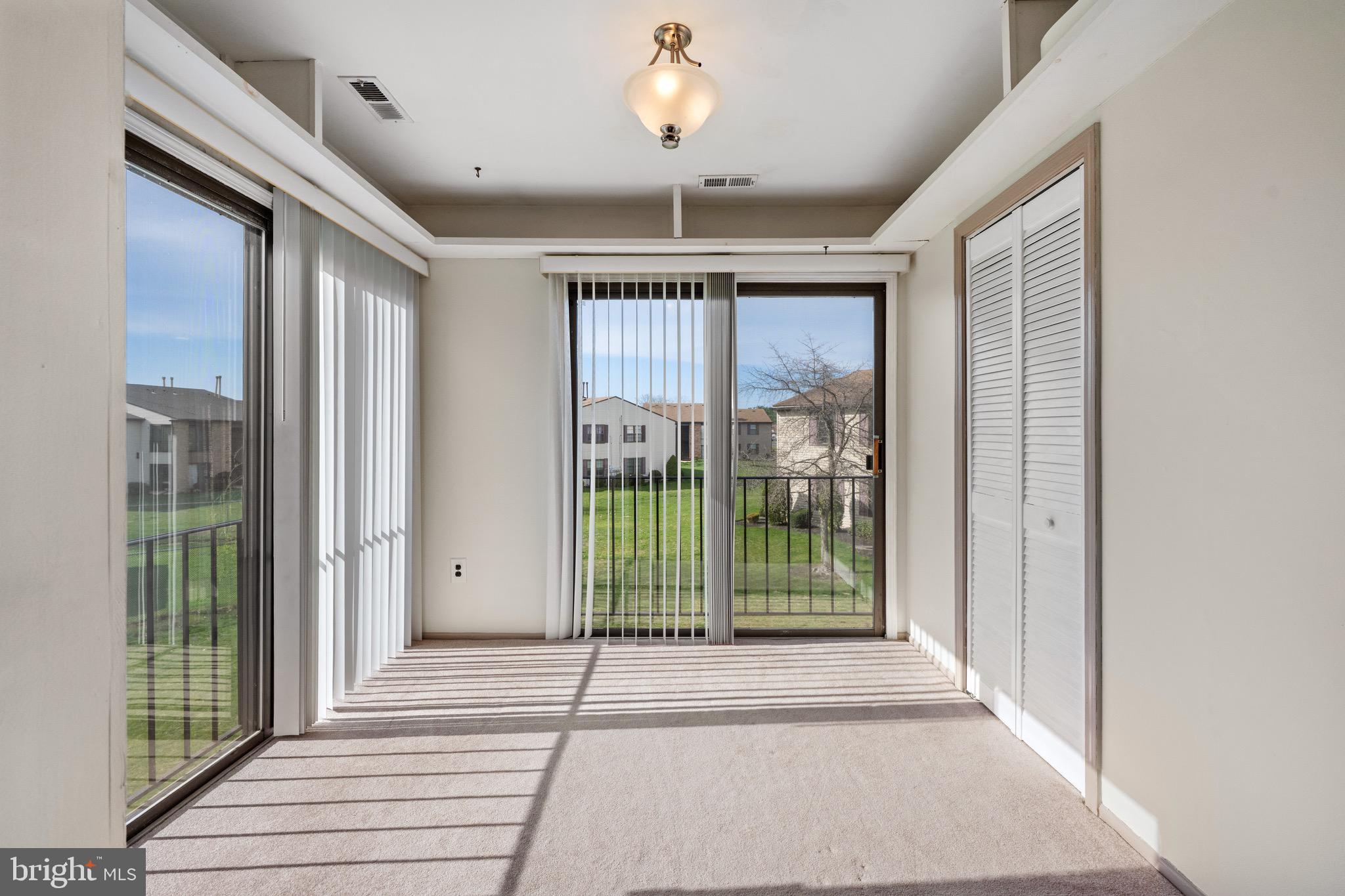 32 Brighton Place Sewell, NJ 08080 - Photo 9 of 21 a view of a room with wooden floor and balcony