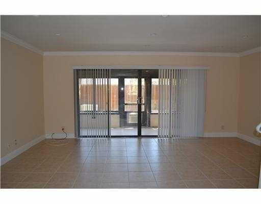 2801 North 34th Avenue Hollywood, FL 33021 - Photo 3 of 9 a view of an empty room with wooden floor