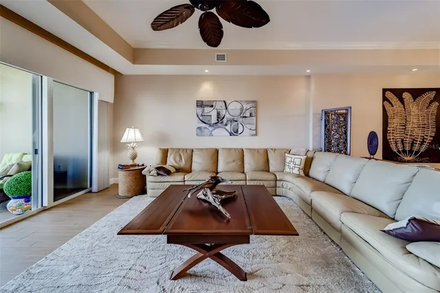 an aerial view of residential building and lake