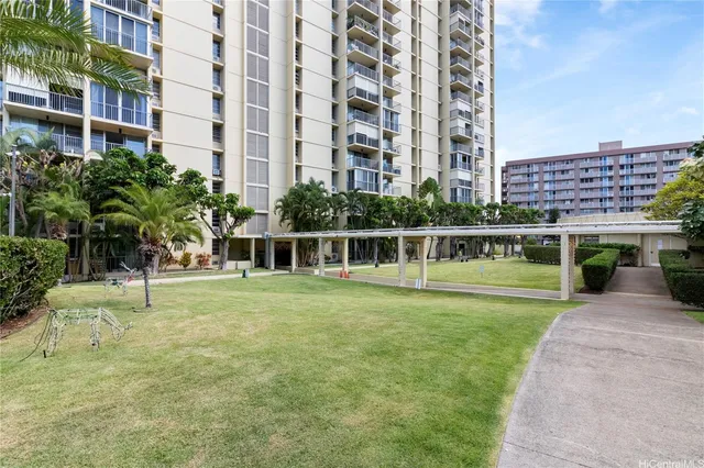 a view of a garden with a apartment