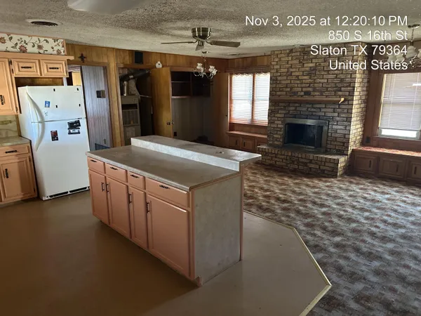 an empty room with wooden floor