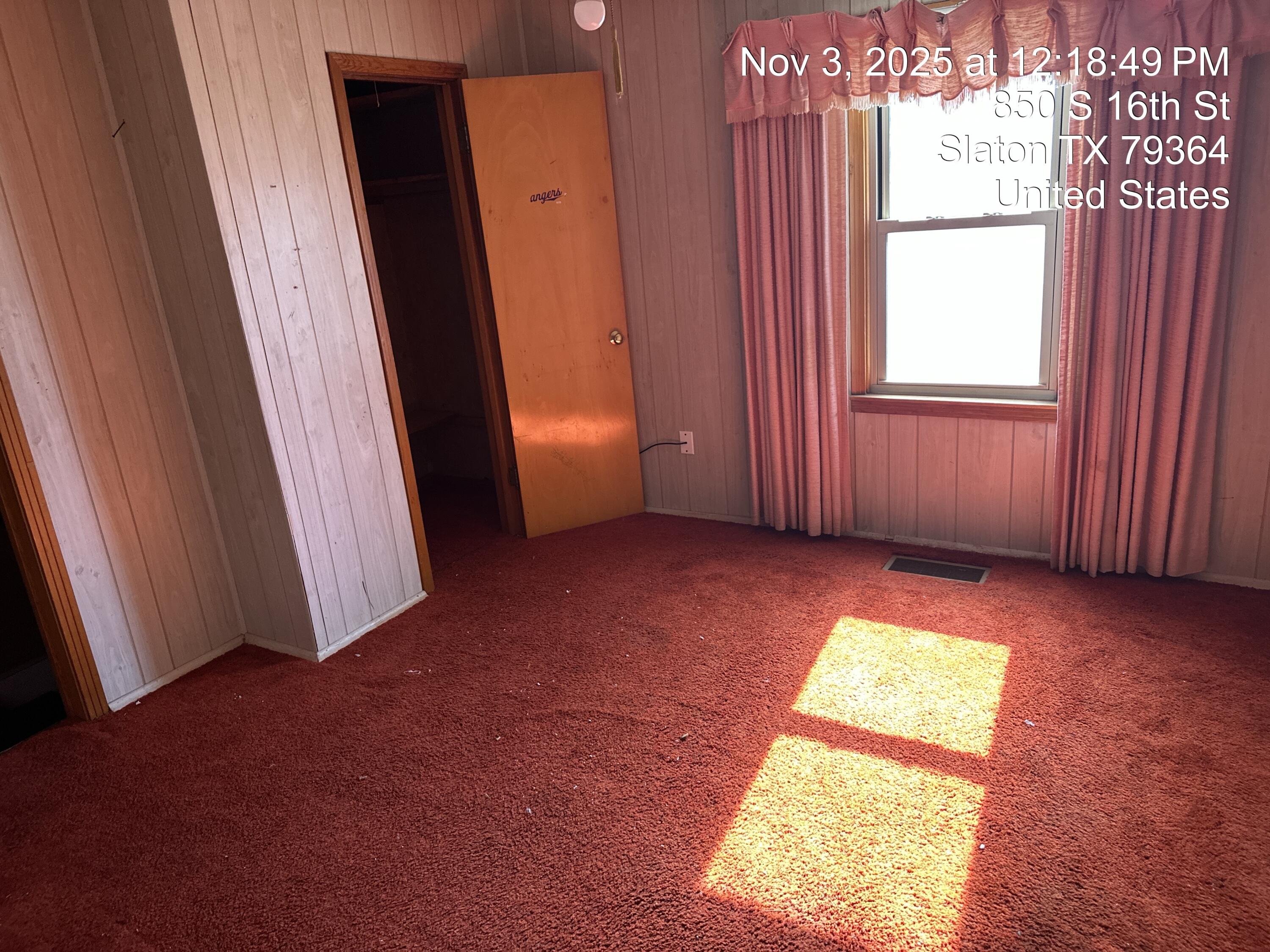 850 South 16th Street Slaton, TX 79364 - Photo 10 of 17 an empty room with windows