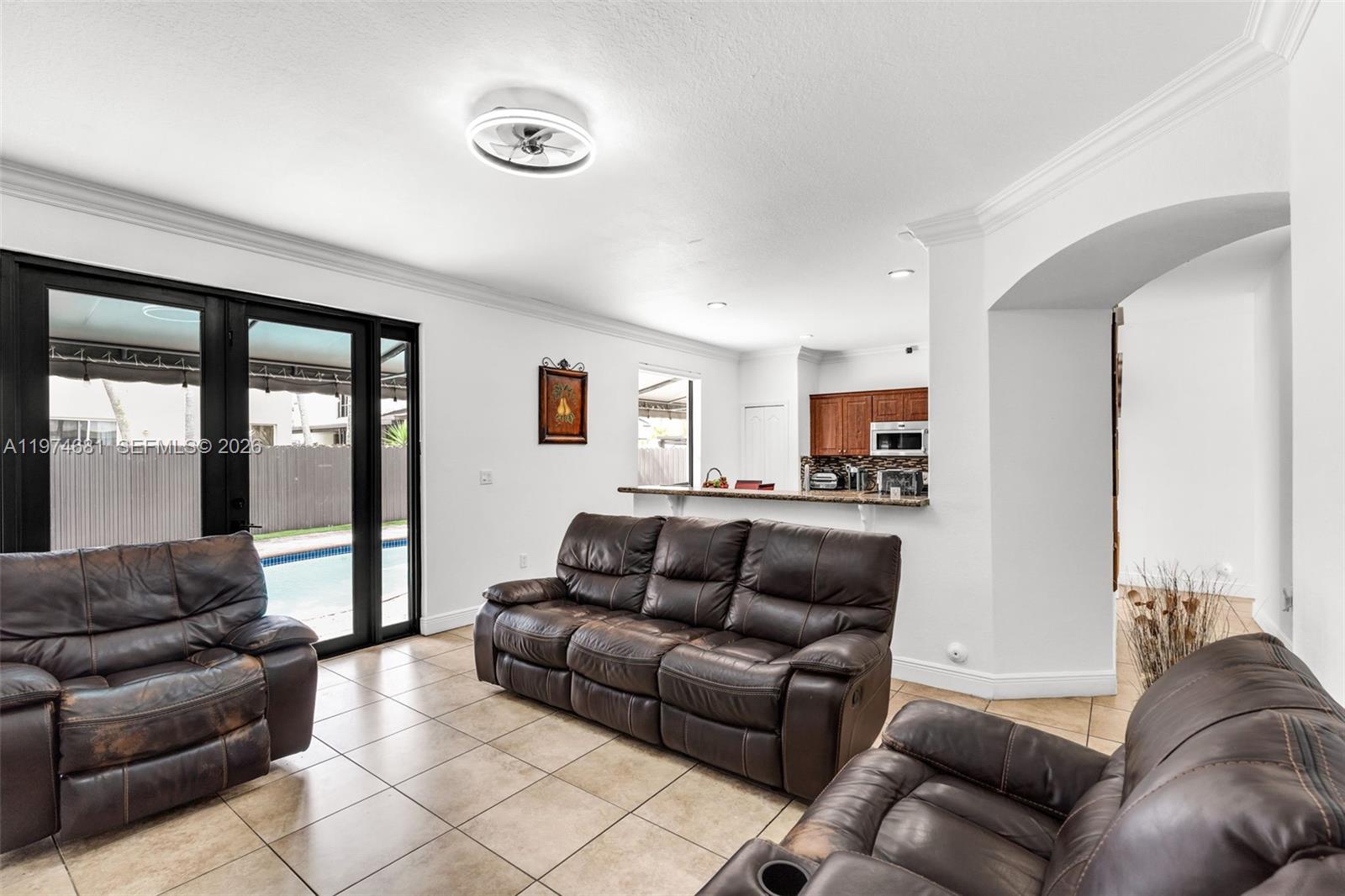 16610 Southwest 57th Lane Miami, FL 33193 - Photo 17 of 57 a living room with furniture and a couch
