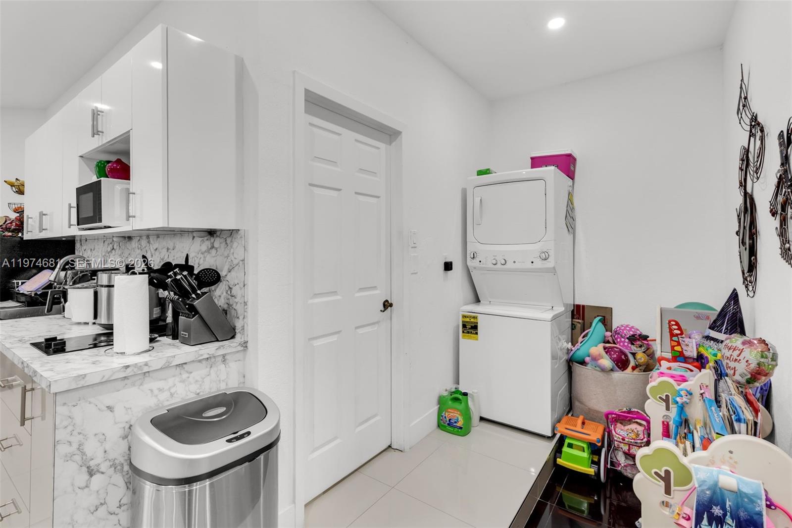 16610 Southwest 57th Lane Miami, FL 33193 - Photo 45 of 57 a room with toys and wooden floor