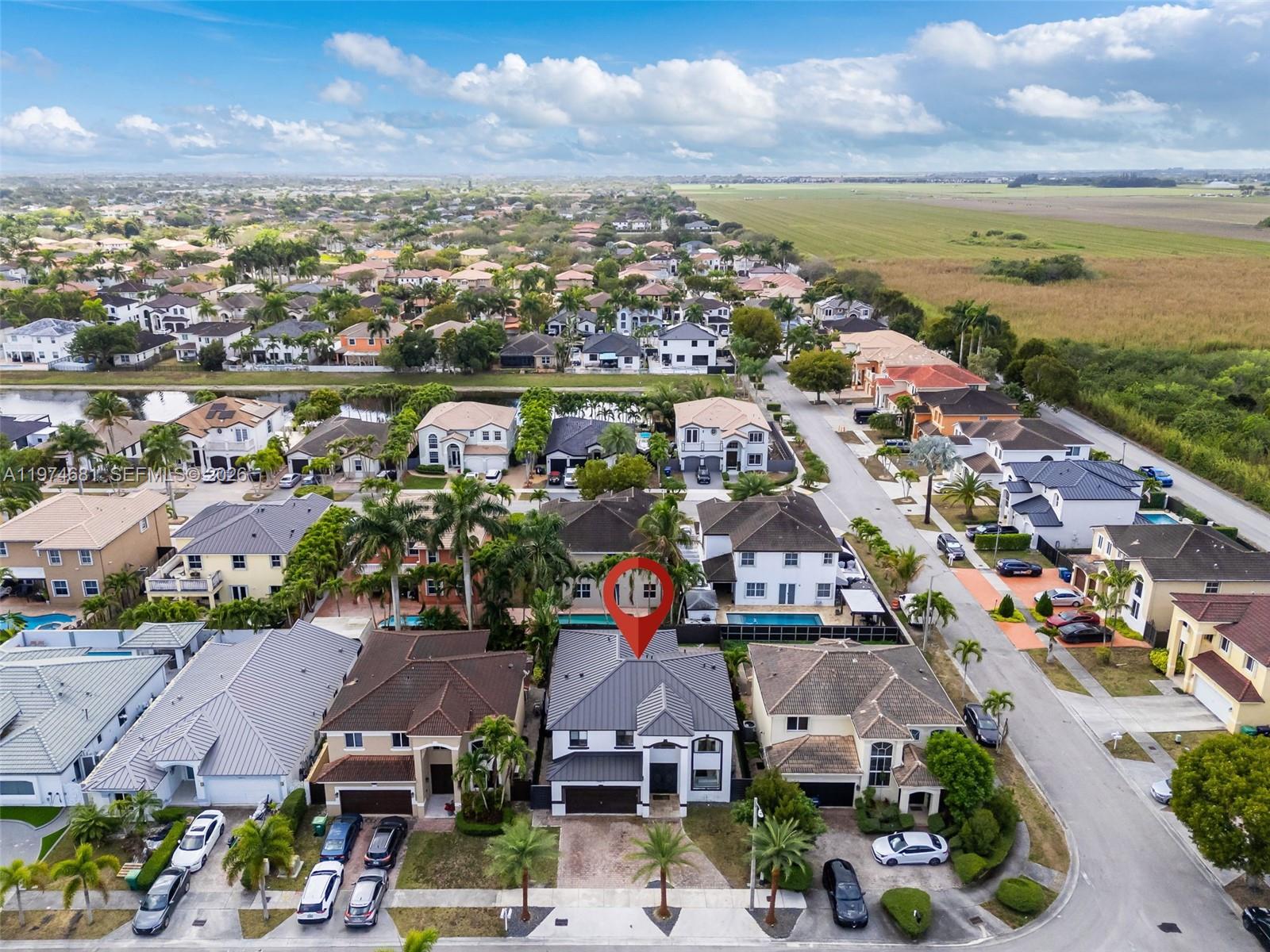 16610 Southwest 57th Lane Miami, FL 33193 - Photo 53 of 57 an aerial view of residential houses with outdoor space