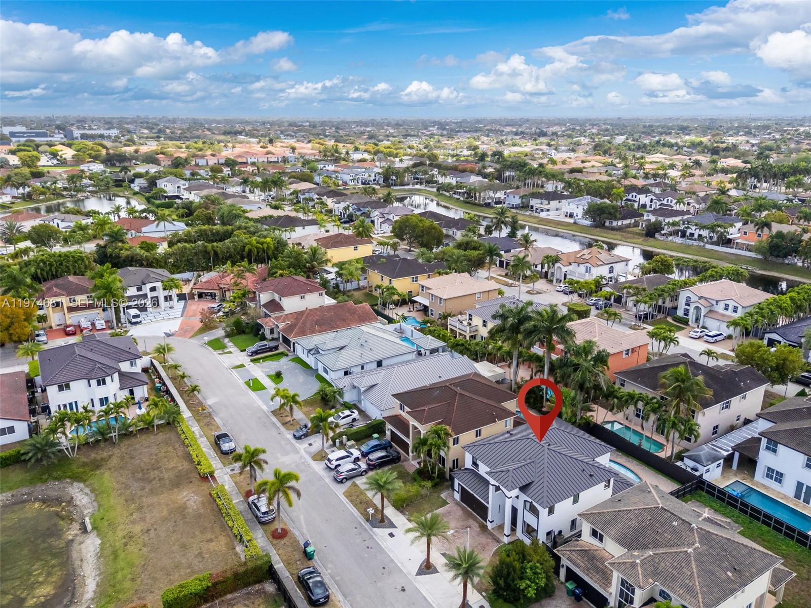 16610 Southwest 57th Lane Miami, FL 33193 - Photo 54 of 57 an aerial view of residential houses with outdoor space