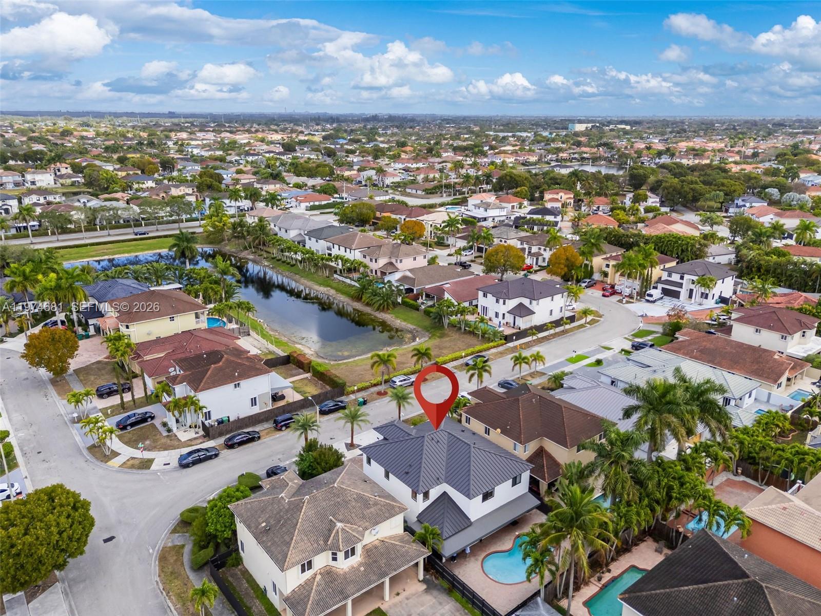 16610 Southwest 57th Lane Miami, FL 33193 - Photo 55 of 57 an aerial view of residential houses with outdoor space