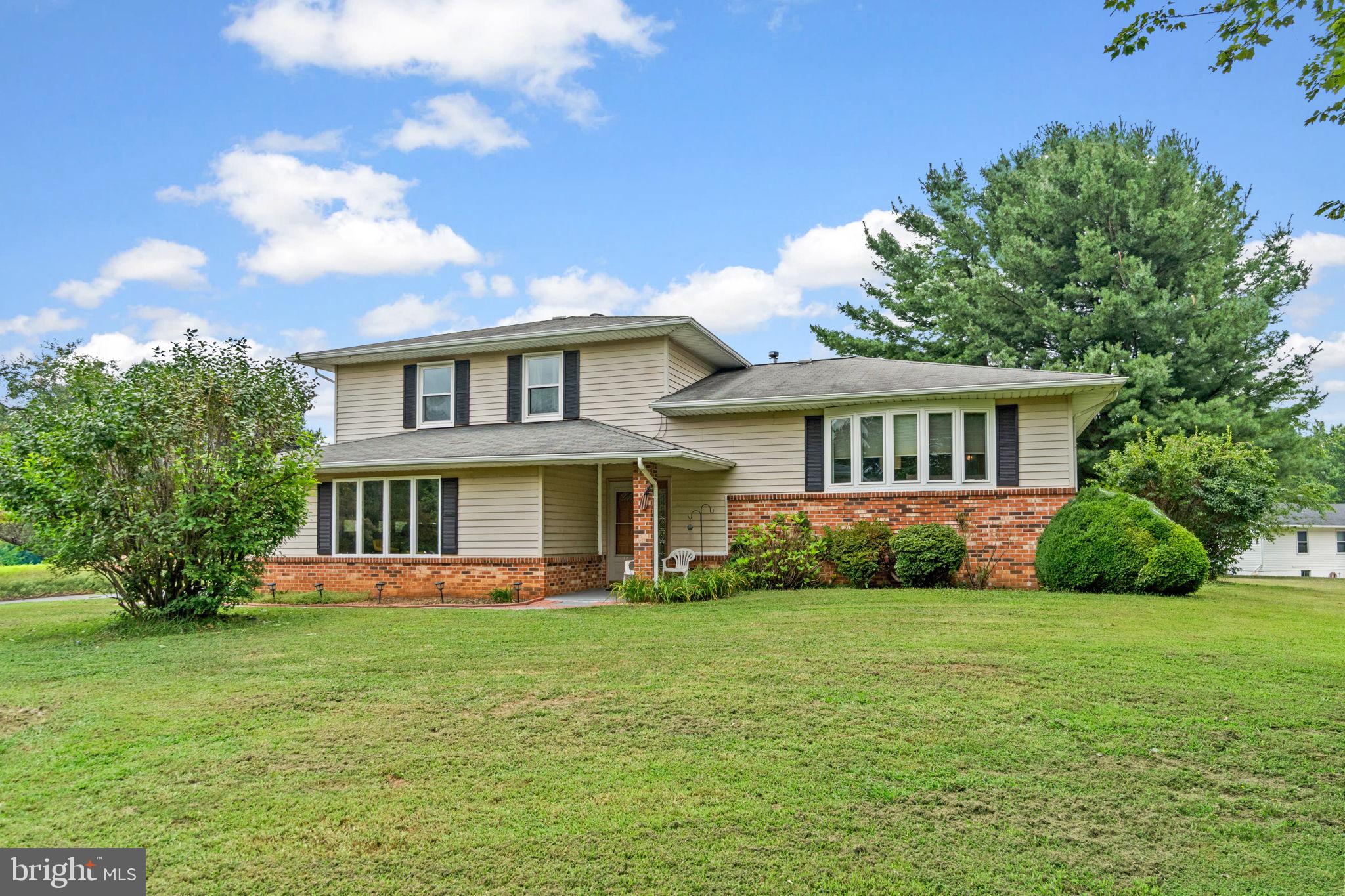 5134 Perry Road Mount Airy, MD 21771 - Photo 1 of 28 a front view of house with yard and green space