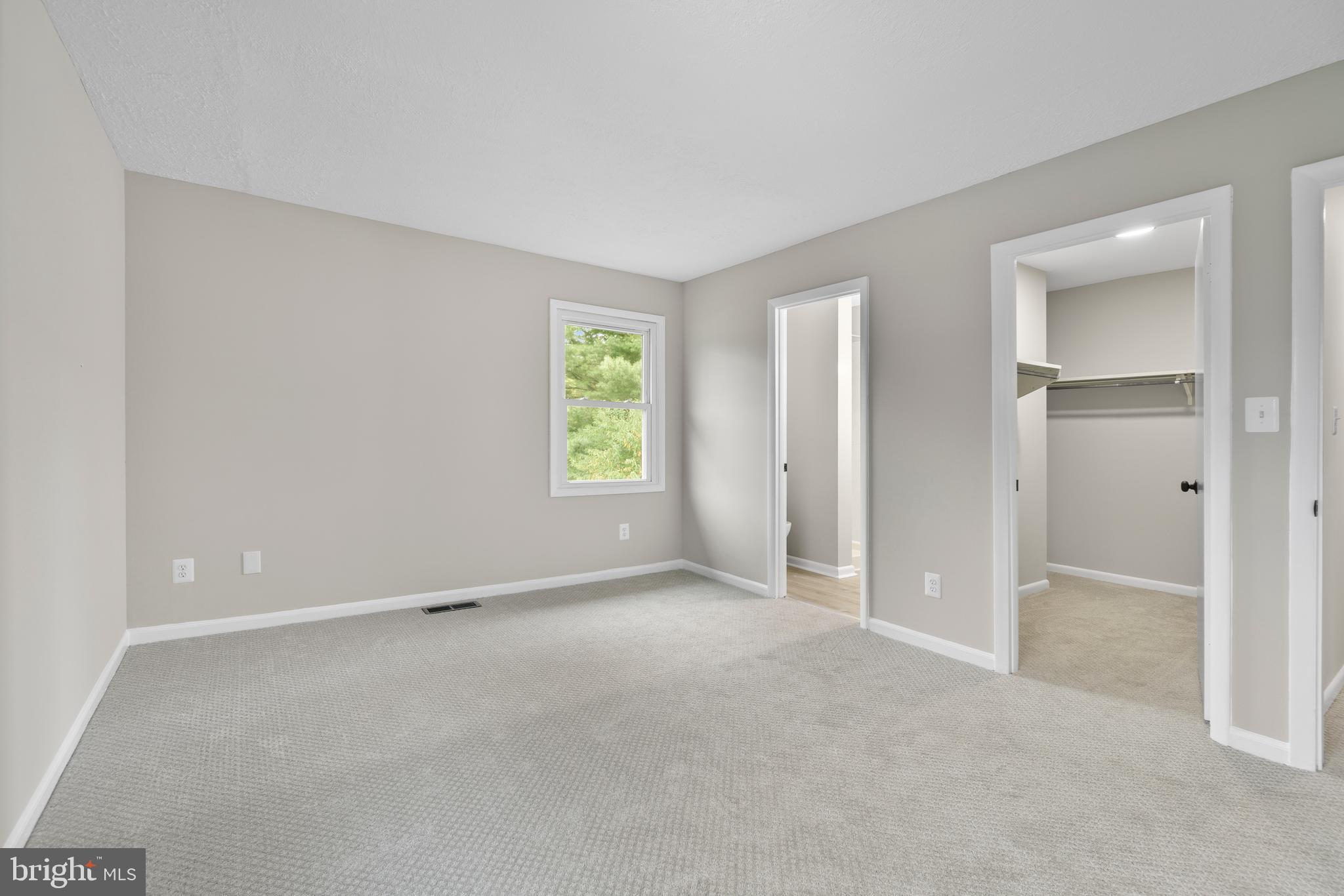 5134 Perry Road Mount Airy, MD 21771 - Photo 18 of 28 an empty room with windows and closet