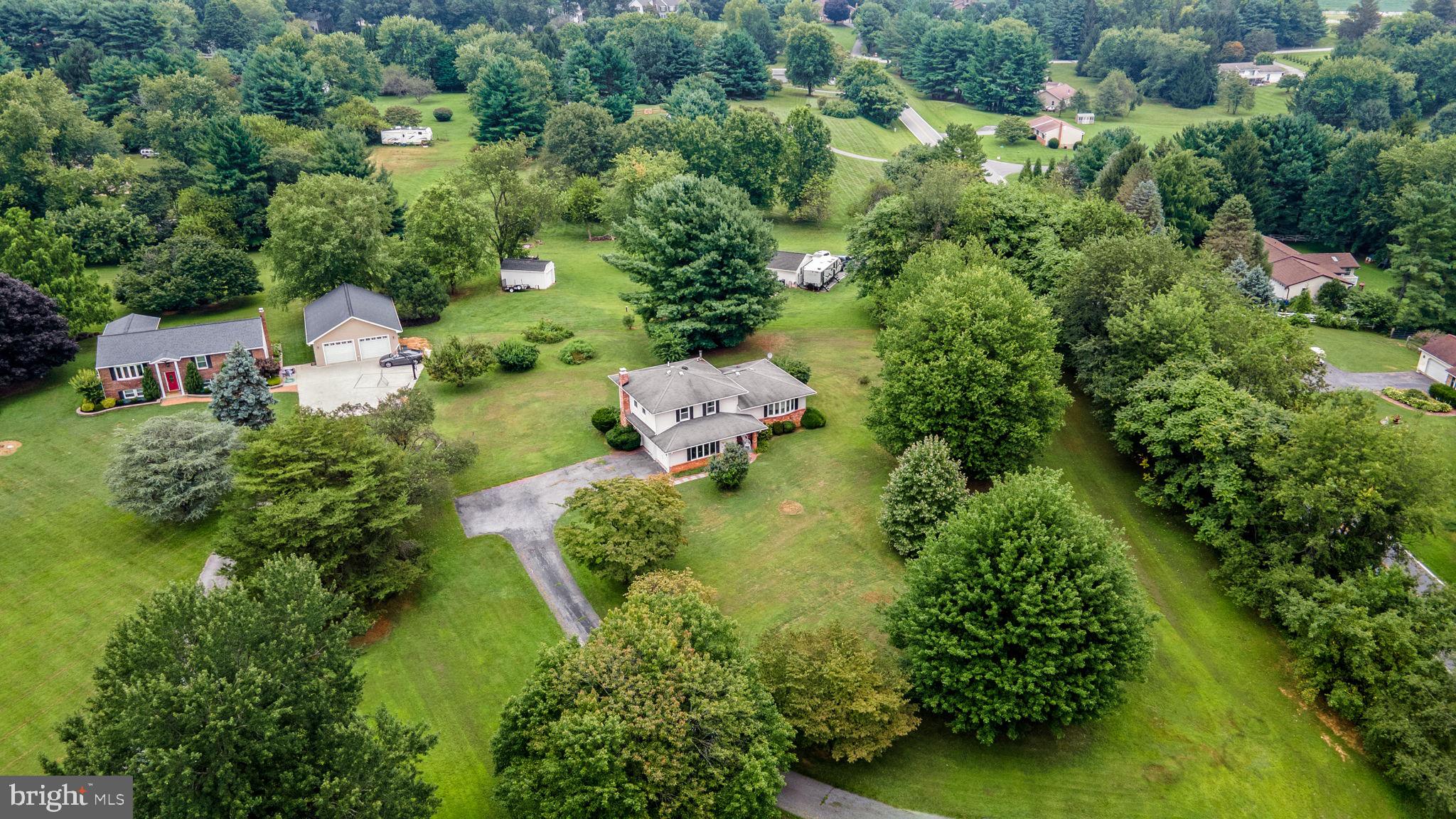 5134 Perry Road Mount Airy, MD 21771 - Photo 2 of 28 an aerial view of residential house with outdoor space and trees all around
