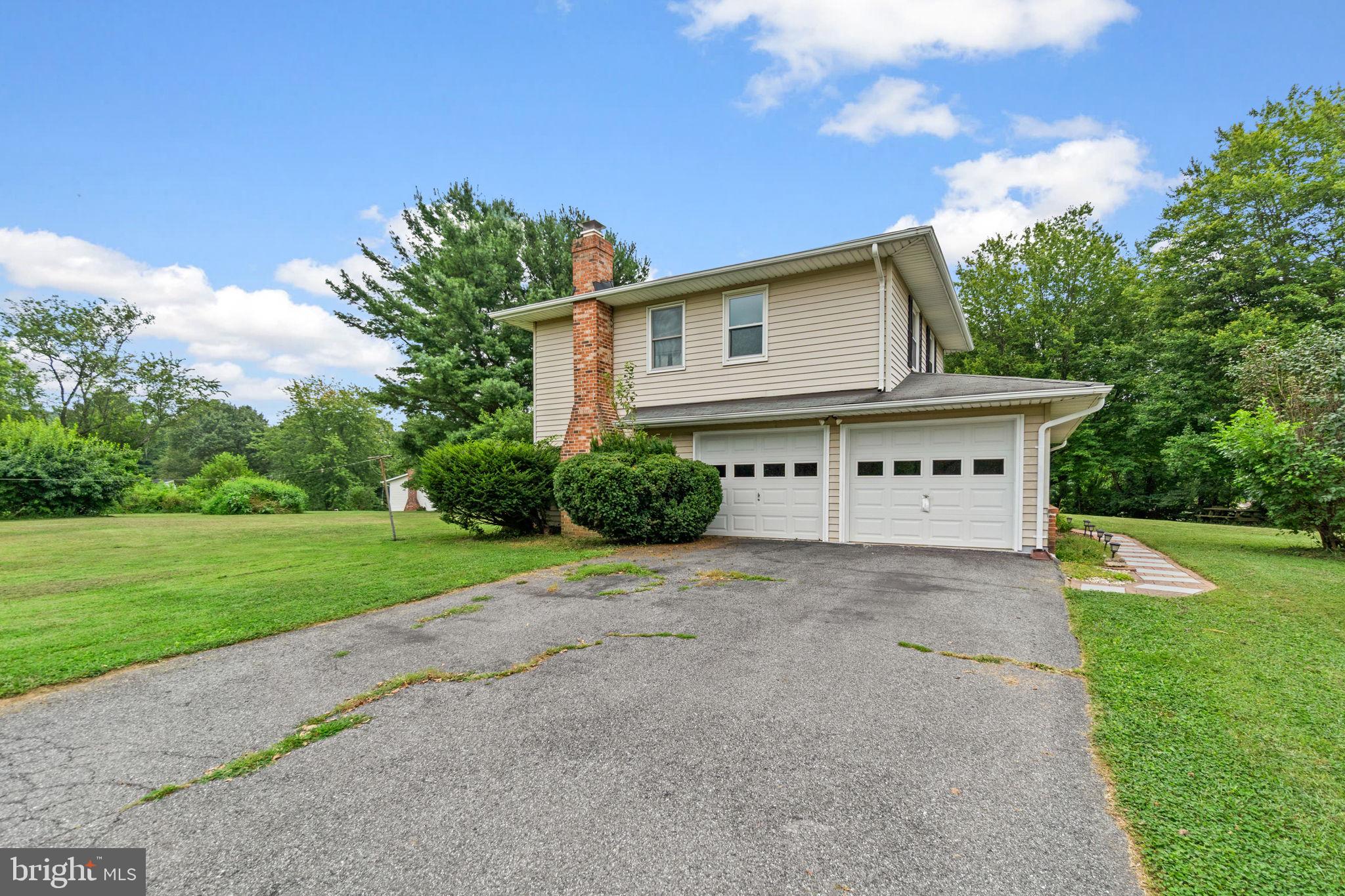 5134 Perry Road Mount Airy, MD 21771 - Photo 23 of 28 a front view of a house with garden