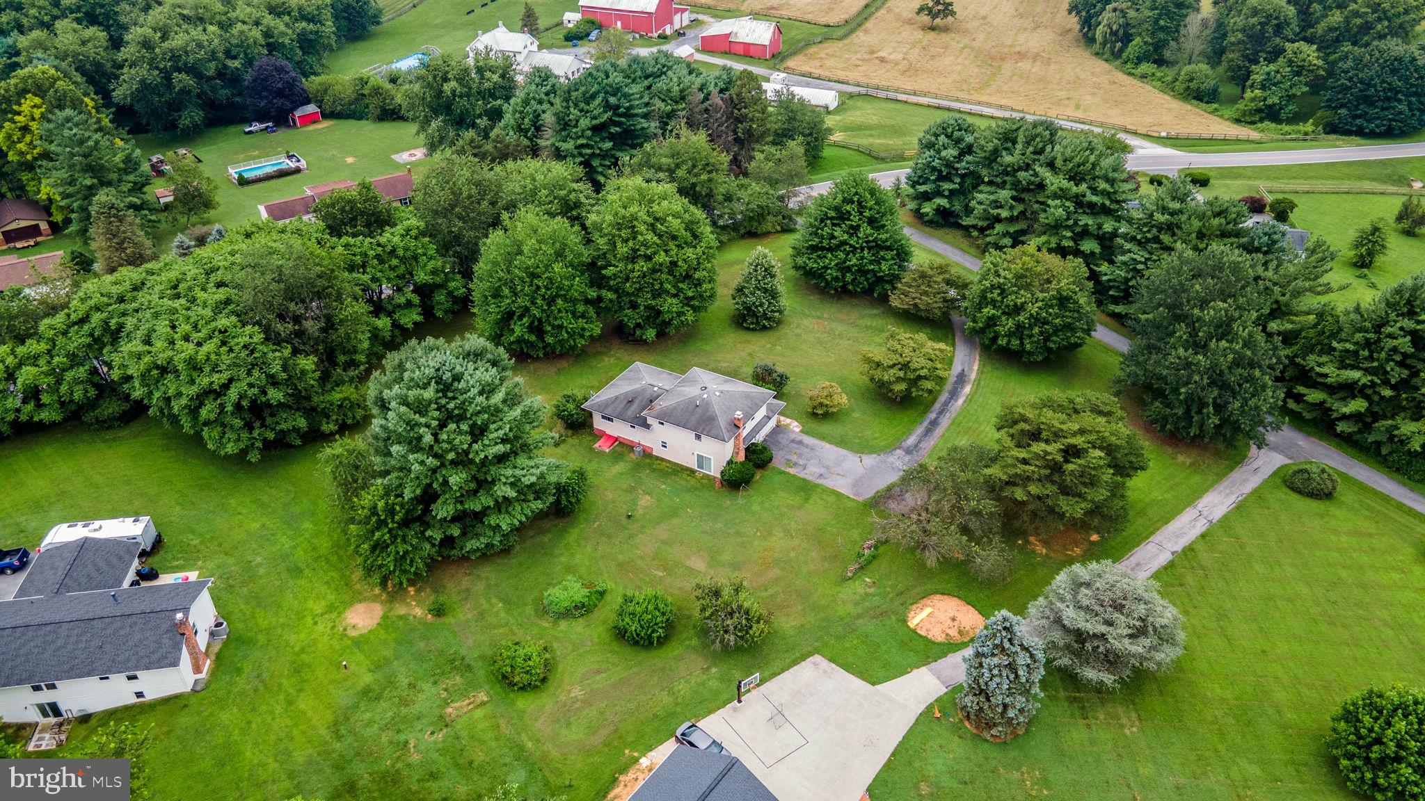 5134 Perry Road Mount Airy, MD 21771 - Photo 25 of 28 an aerial view of a house with a yard and lake view