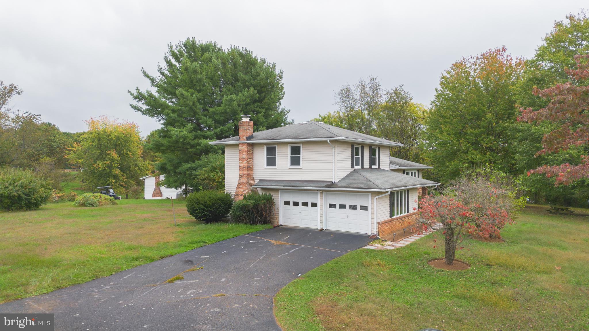 5134 Perry Road Mount Airy, MD 21771 - Photo 27 of 28 a view of a house with a yard