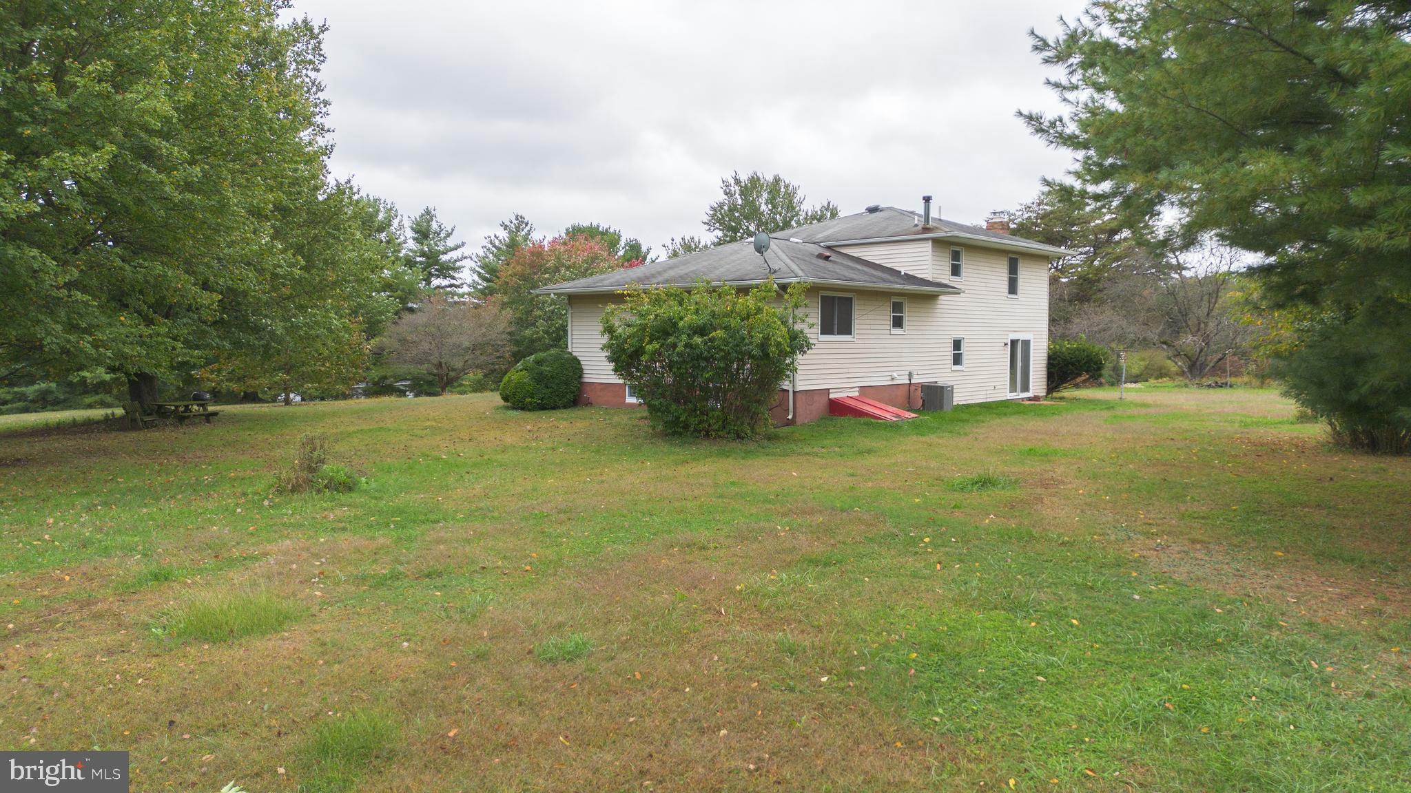 5134 Perry Road Mount Airy, MD 21771 - Photo 28 of 28 a front view of a house with a yard and garage