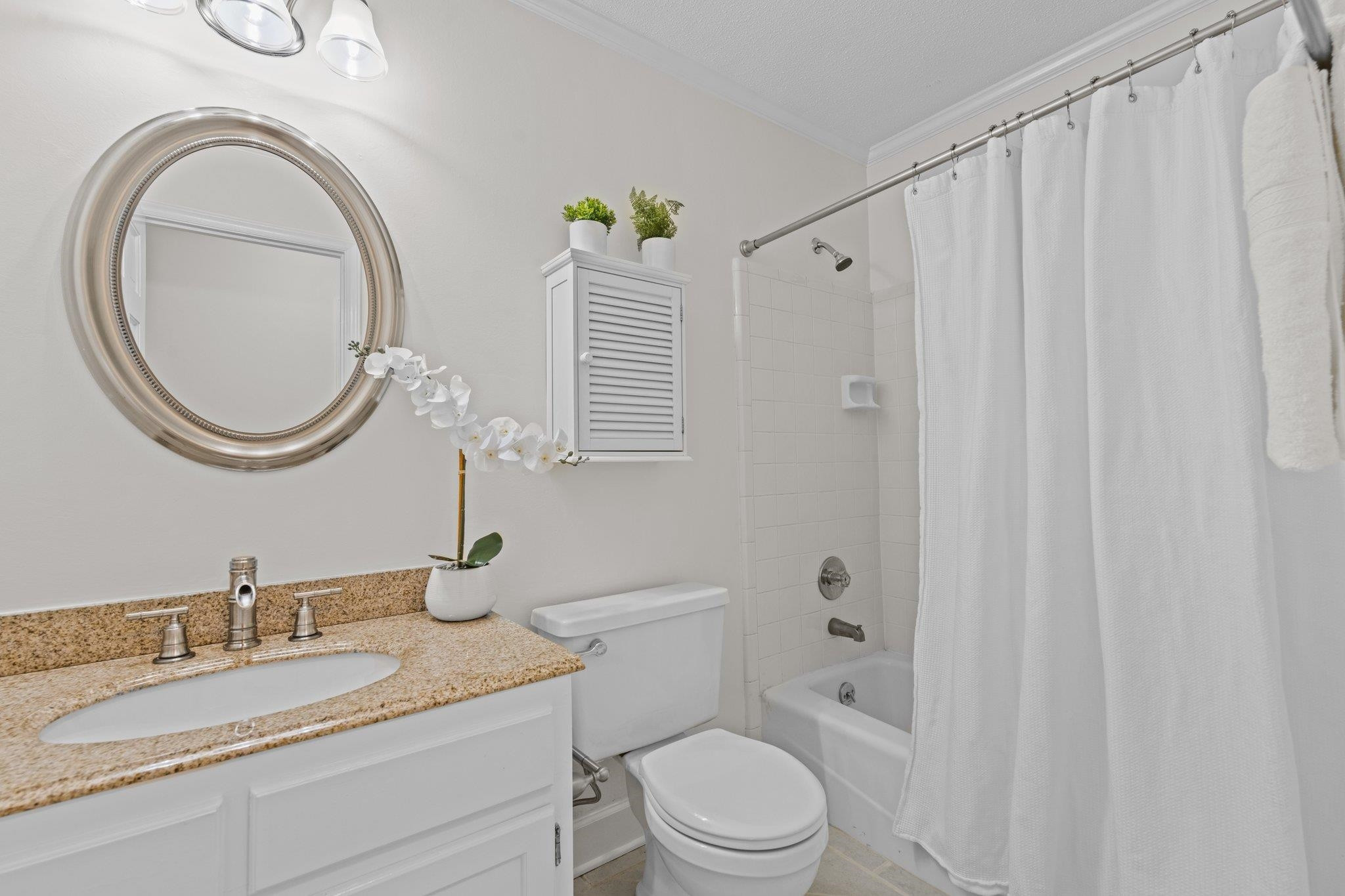 7321 Ridge Grove Court Raleigh, NC 27615 - Photo 15 of 33 Hall Bathroom with Granite Countertops