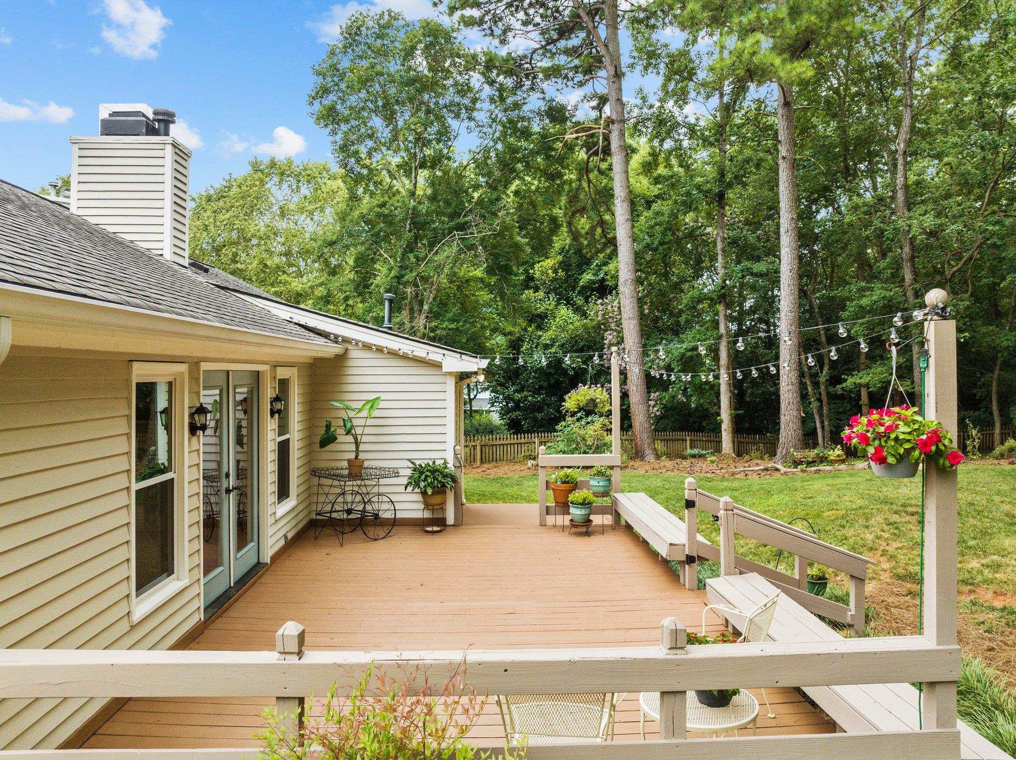 7321 Ridge Grove Court Raleigh, NC 27615 - Photo 25 of 33 Oversized Stained Wood Deck