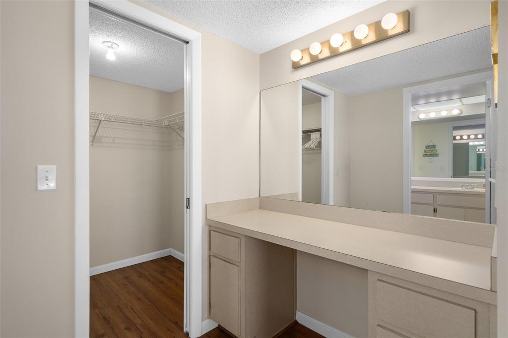 8141 Aquila Street, Unit 334 Port Richey, FL 34668 - Photo 27 of 61 a bathroom with a sink and a mirror