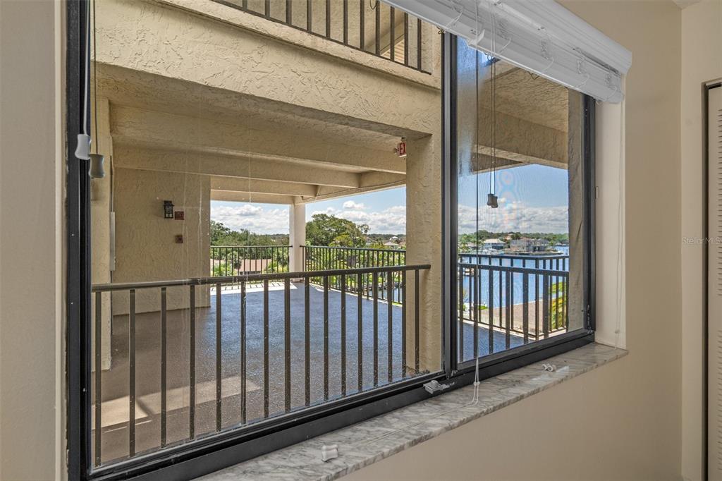 8141 Aquila Street, Unit 334 Port Richey, FL 34668 - Photo 33 of 61 a view of a balcony with a door