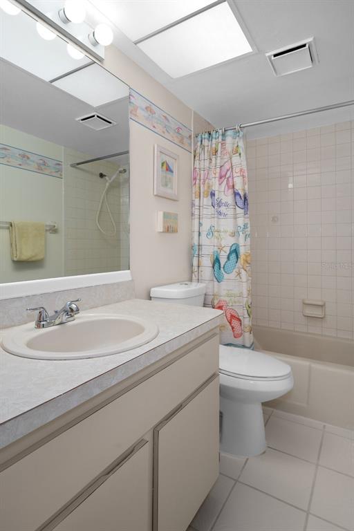 8141 Aquila Street, Unit 334 Port Richey, FL 34668 - Photo 35 of 61 a bathroom with a sink toilet and shower