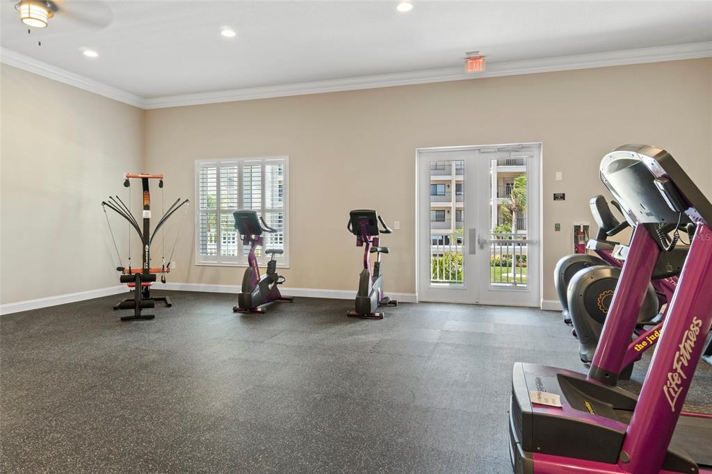 8141 Aquila Street, Unit 334 Port Richey, FL 34668 - Photo 47 of 61 a view of a room with gym equipment