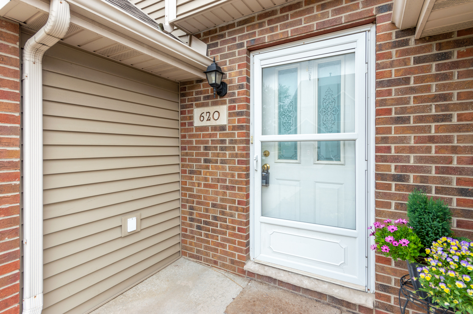 620 South Peace Road, Unit 1 Sycamore, IL 60178 - Photo 7 of 15 a view of entrance door of the house