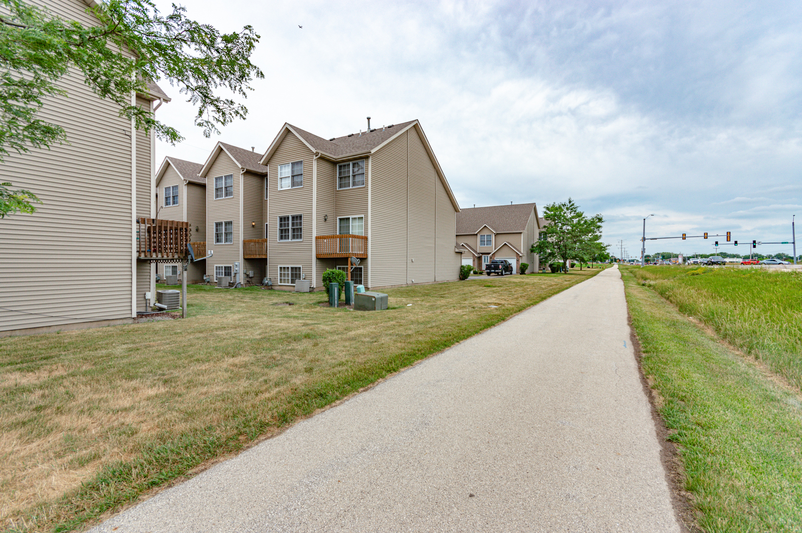 620 South Peace Road, Unit 1 Sycamore, IL 60178 - Photo 10 of 15 a view of a house with a yard