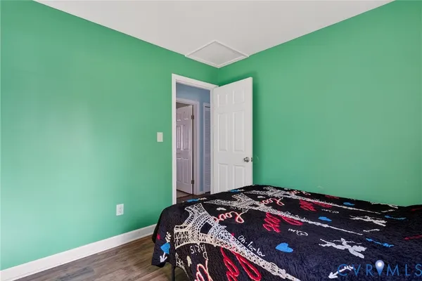 a bedroom with a bed and a cabinets