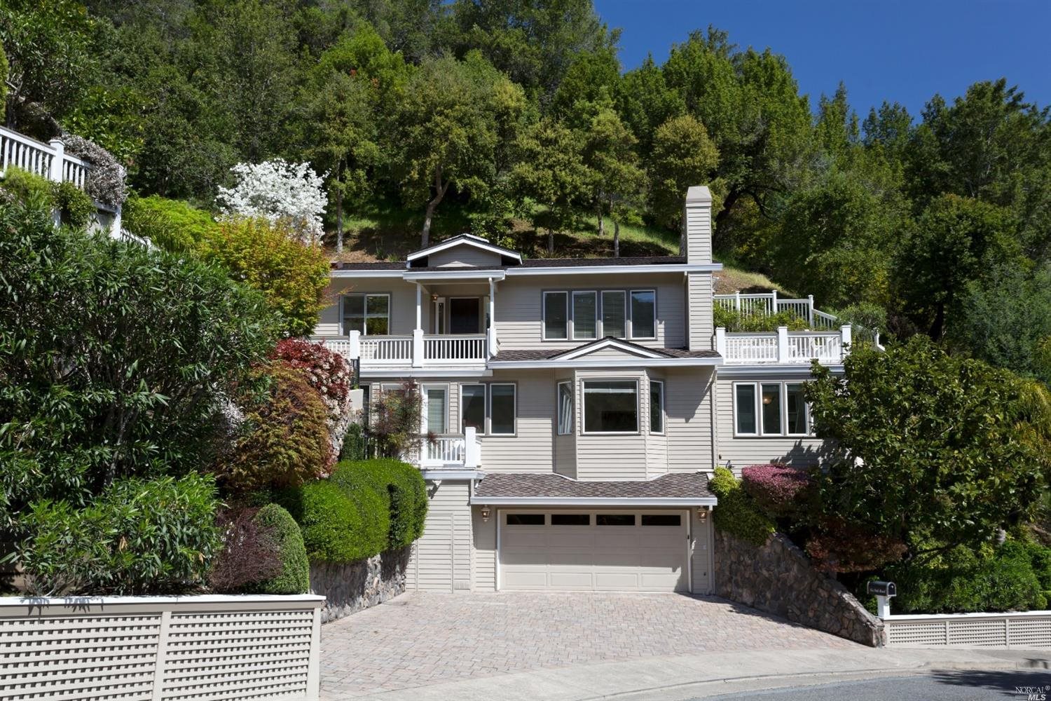 6 Oak Road Larkspur, CA 94939 - Photo 1 of 1 a front view of a house with a garden