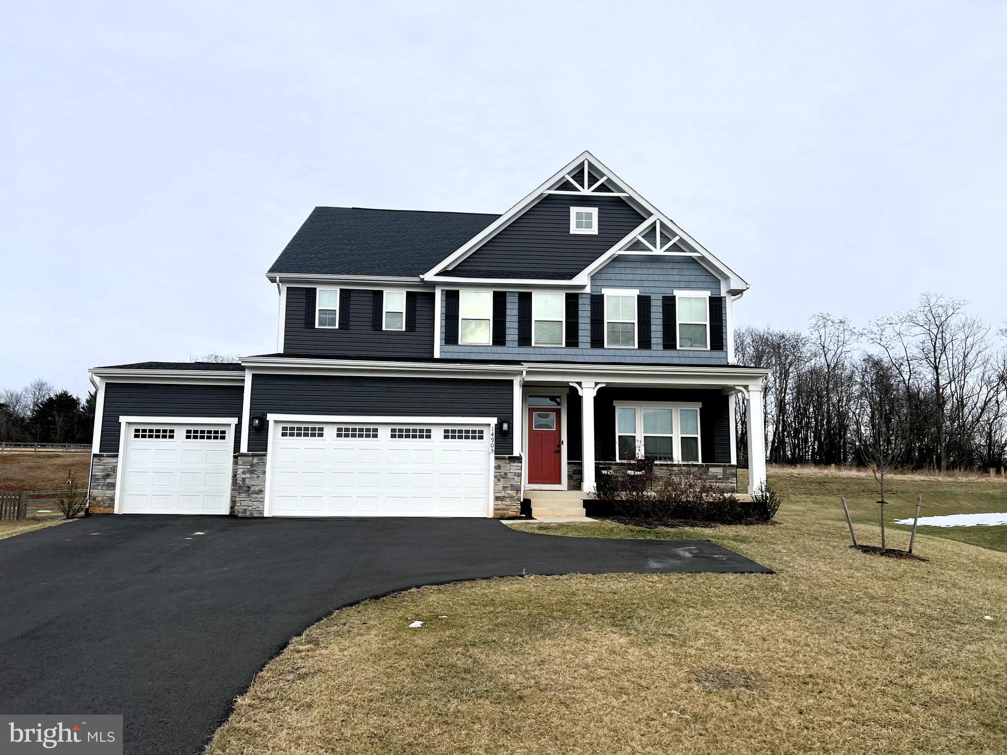14905 Mapleridge Road Culpeper, VA 22701 - Photo 1 of 40 a front view of a house with a yard