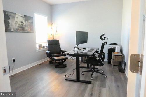 14905 Mapleridge Road Culpeper, VA 22701 - Photo 11 of 40 a view of a workspace with furniture and a window