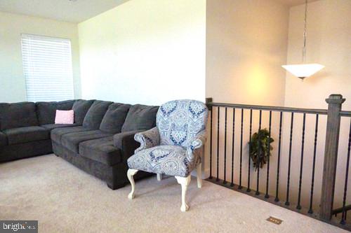 14905 Mapleridge Road Culpeper, VA 22701 - Photo 14 of 40 a living room with furniture and a window
