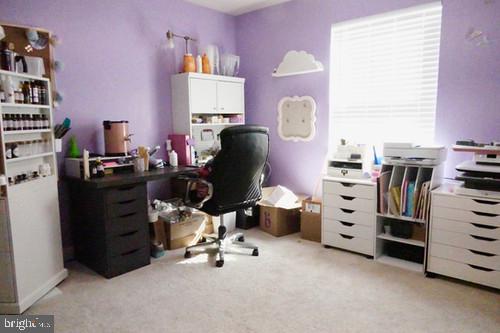14905 Mapleridge Road Culpeper, VA 22701 - Photo 18 of 40 a view of a workspace with furniture and a window