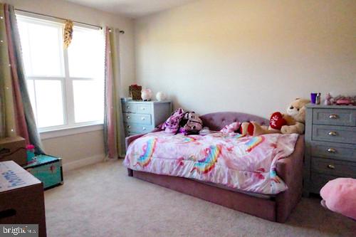 14905 Mapleridge Road Culpeper, VA 22701 - Photo 20 of 40 a bedroom with a bed and a window