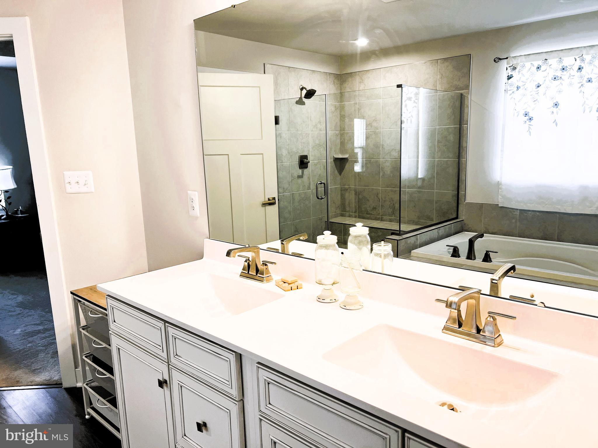 14905 Mapleridge Road Culpeper, VA 22701 - Photo 22 of 40 a bathroom with a sink and a mirror