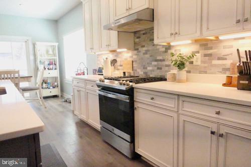 14905 Mapleridge Road Culpeper, VA 22701 - Photo 28 of 40 a kitchen with stainless steel appliances white cabinets and a sink