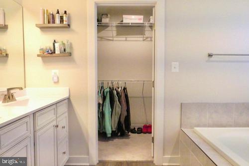 14905 Mapleridge Road Culpeper, VA 22701 - Photo 33 of 40 a bathroom with a tub and a sink