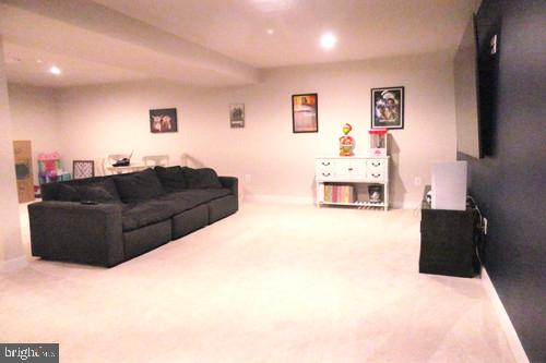 14905 Mapleridge Road Culpeper, VA 22701 - Photo 36 of 40 a living room with furniture and a couch