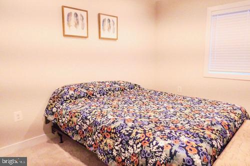 14905 Mapleridge Road Culpeper, VA 22701 - Photo 37 of 40 a bedroom with a bed