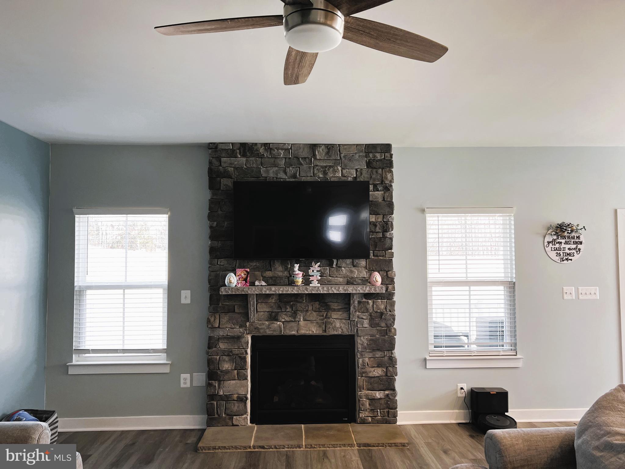 14905 Mapleridge Road Culpeper, VA 22701 - Photo 10 of 40 a living room with furniture and a fireplace
