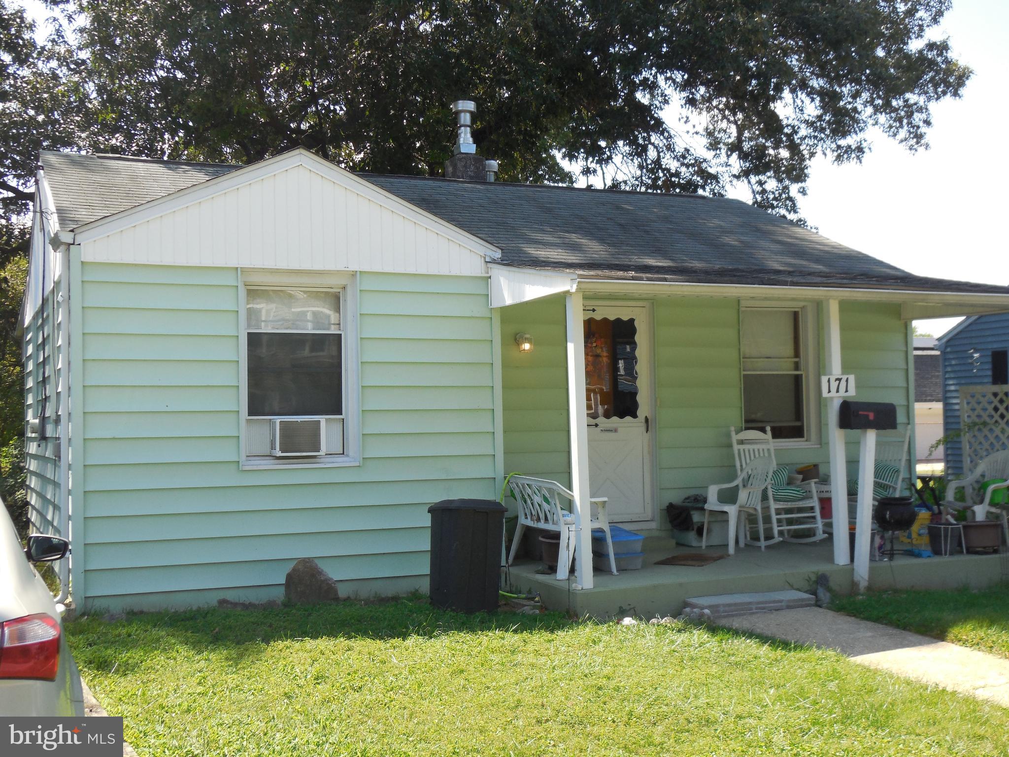 171 Riverside Road Baltimore, MD 21221 - Photo 3 of 21 a view of a house with a yard
