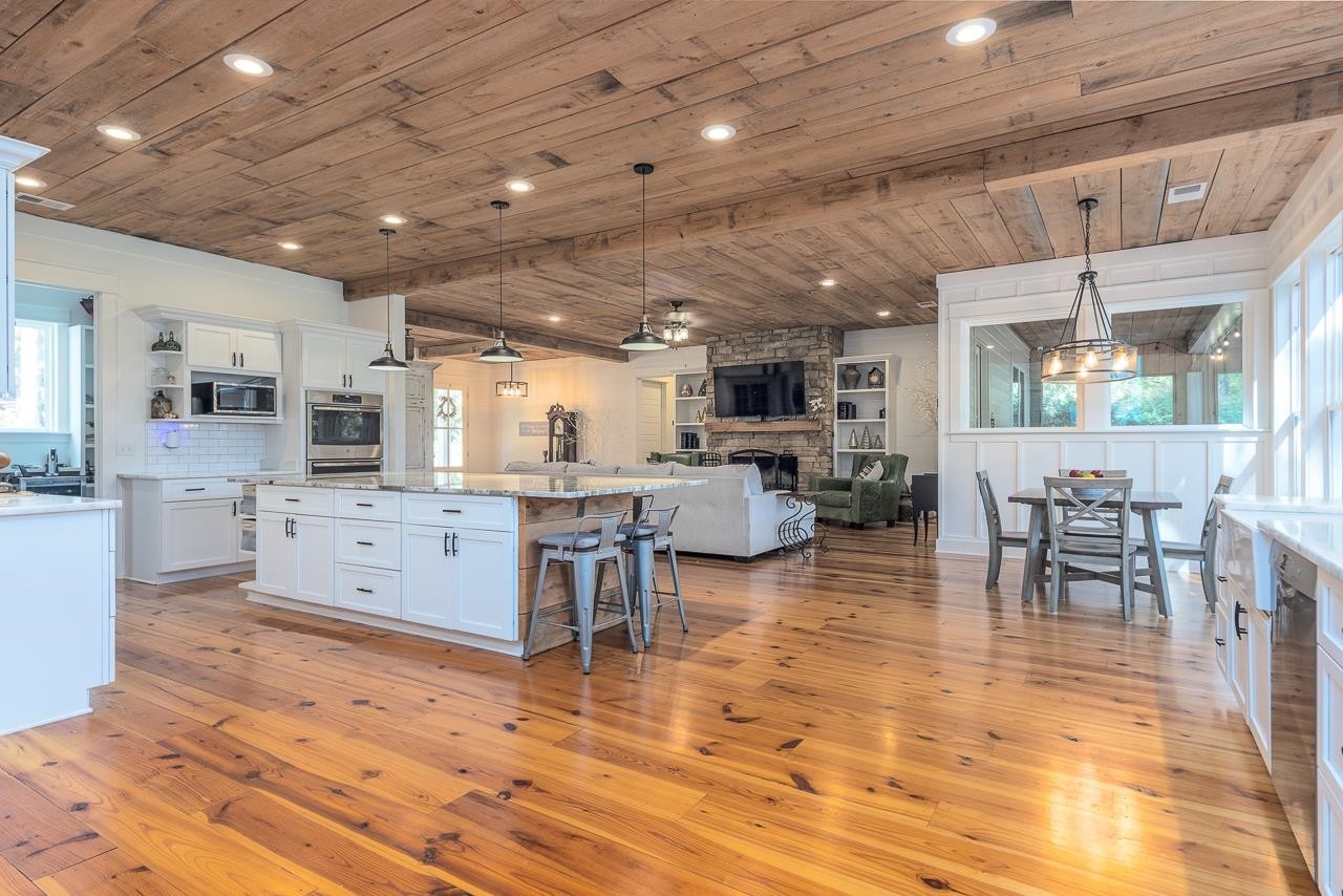 570 Wildwood Road Eads, TN 38028 - Photo 13 of 38 a large room with lots of wooden furniture and glass windows