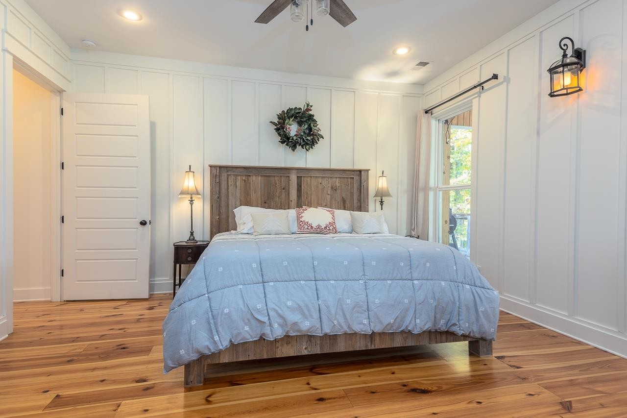 570 Wildwood Road Eads, TN 38028 - Photo 24 of 38 a bedroom with a bed and a painting on the wall