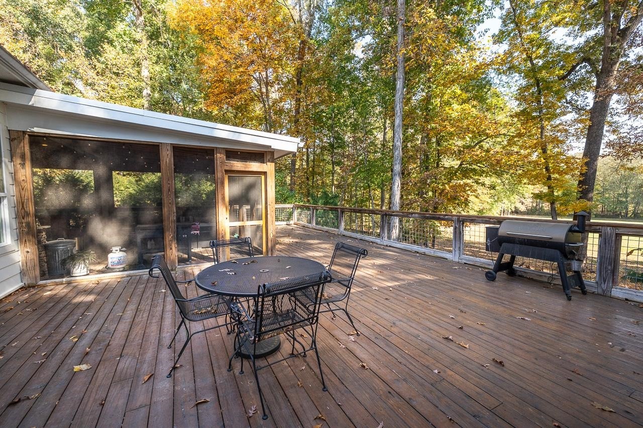 570 Wildwood Road Eads, TN 38028 - Photo 28 of 38 a view of a chairs and table on the wooden floor