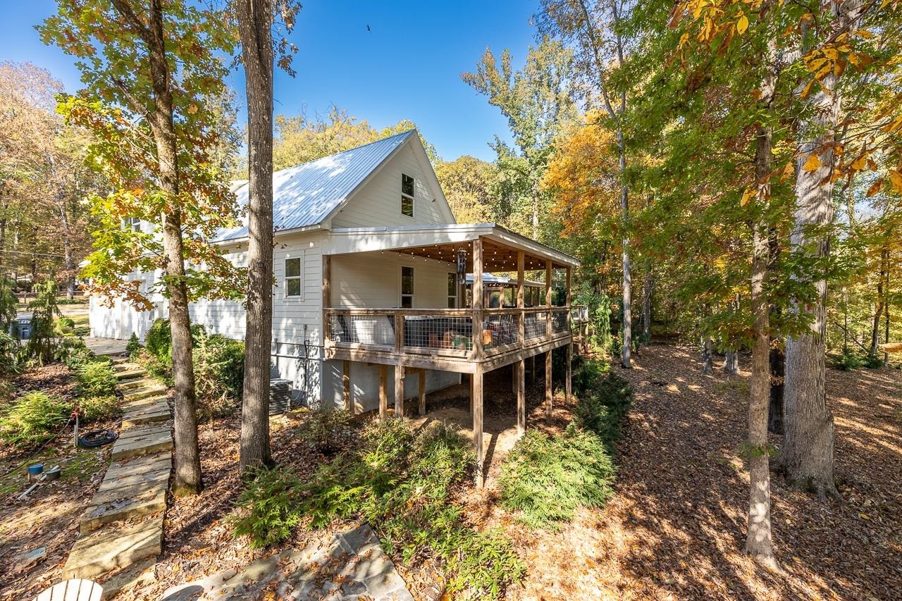 570 Wildwood Road Eads, TN 38028 - Photo 31 of 38 a view of a house with backyard and sitting area