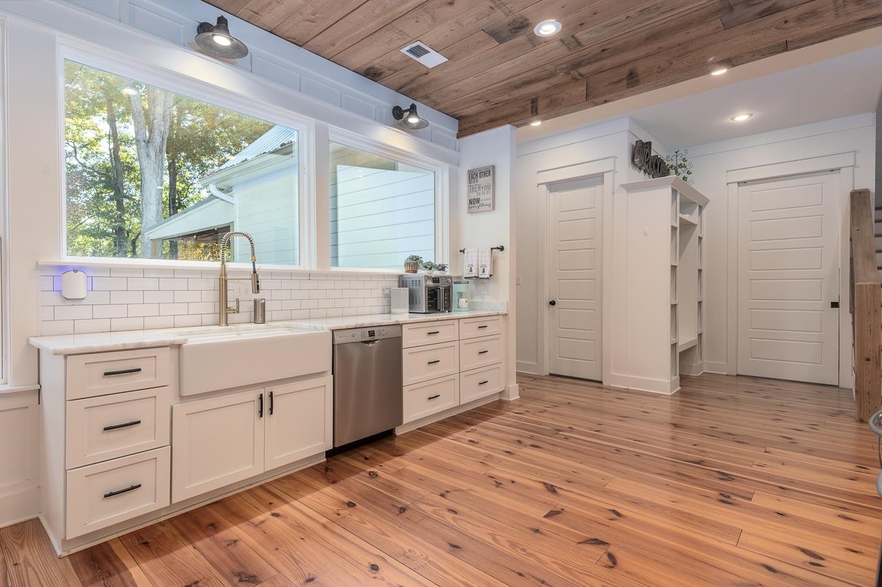 570 Wildwood Road Eads, TN 38028 - Photo 5 of 38 a spacious bathroom with a double vanity sink a large mirror and shower