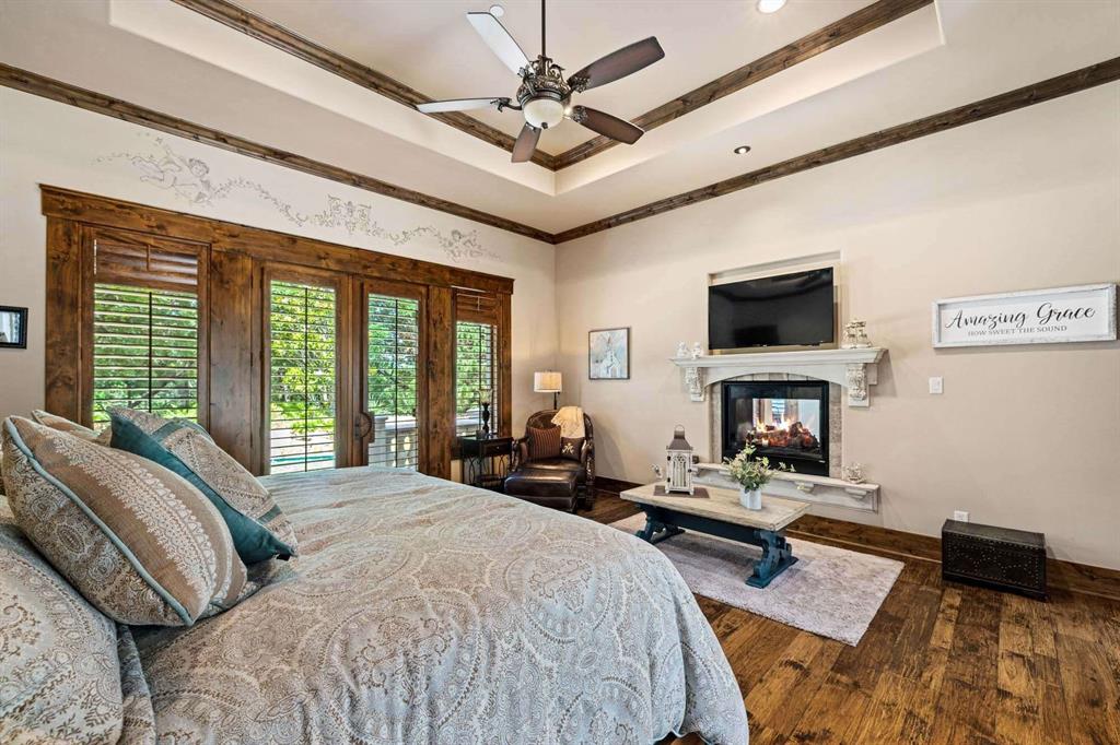 2115 Paradise Rnch Trail McKinney, TX 75071 - Photo 17 of 40 Tray ceiling with wood-finish beams, integrated ceiling fan, and recessed lighting
