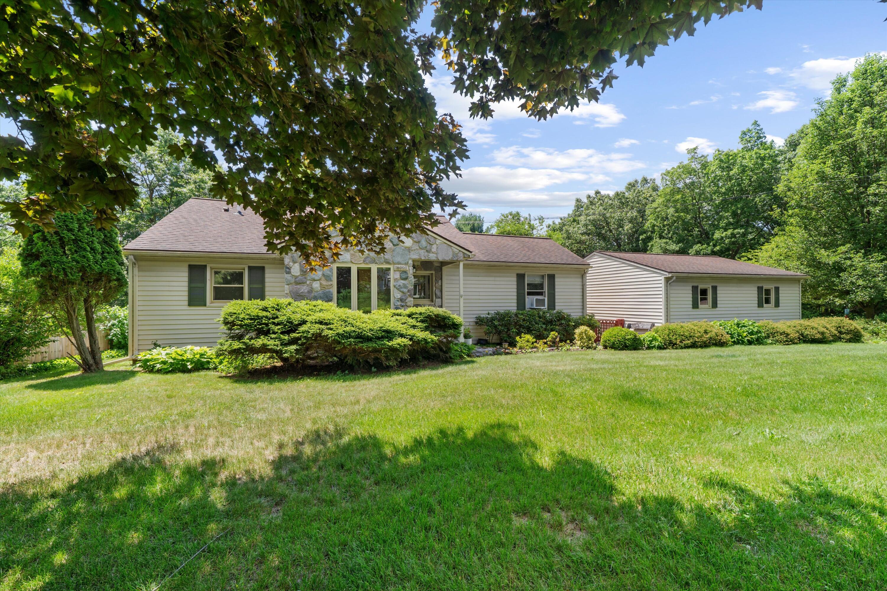 16009 Cavanaugh Lake Road Chelsea, MI 48118 - Photo 1 of 56 Front