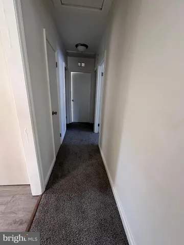 en empty room with windows