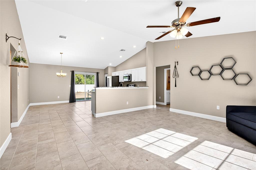 501 Marion Oaks Golf Road Ocala, FL 34473 - Photo 26 of 33 a view of livingroom with hardwood floor and a ceiling fan