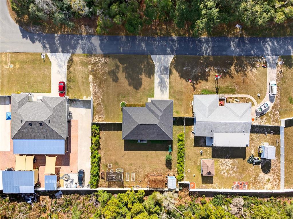 501 Marion Oaks Golf Road Ocala, FL 34473 - Photo 32 of 33 an aerial view of residential house with parking